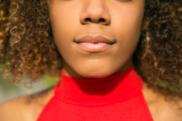 Lips and lower face of young African American 