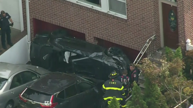 Car-lands-in-Queens-driveway.png 