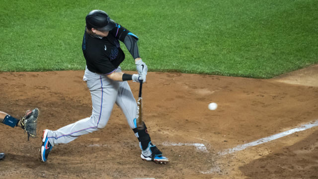 Marlins clinch 1st playoff berth since 2003, beat Yanks 4-3