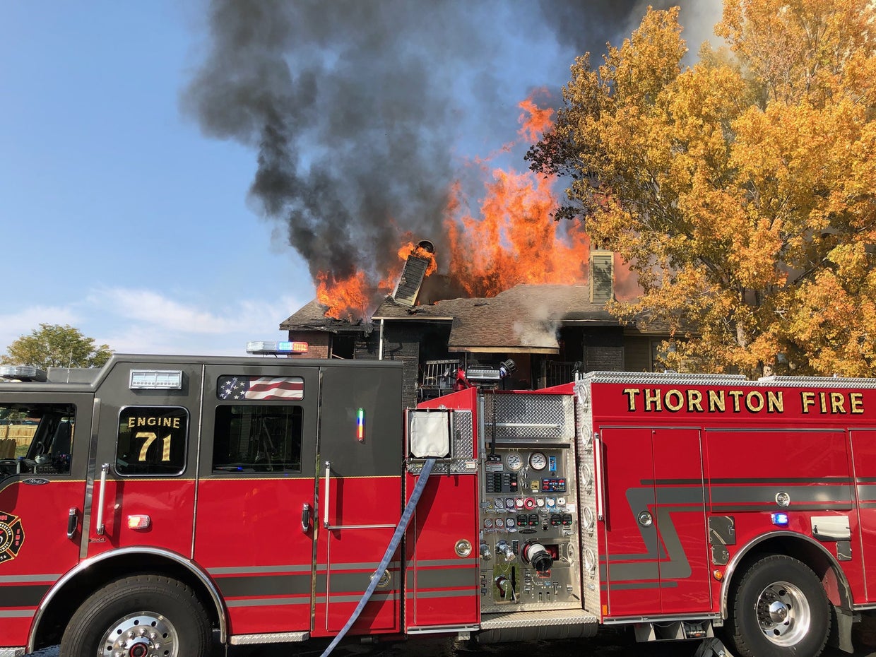 4 Injured As Flames Shoot From Roof Of Skyline Apartments In Thornton