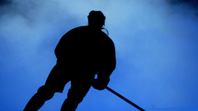 A player skates through the smoke during introductions prior to game one of the Western Conference quarterfinal series of the 2004 Stanley Cup Playoffs between the San Jose Sharks and the St. Louis Blues on April 8, 2004, at the HP Pavilion in San Jose, California. 