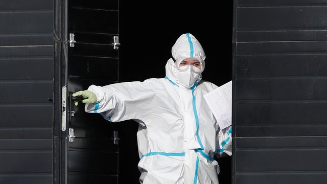 A medical specialist is seen at the door of a hospital for patients infected with coronavirus disease in Moscow 