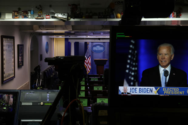President-Elect Joe Biden's Address To The Nation Is Shown On Televisions At The White House 