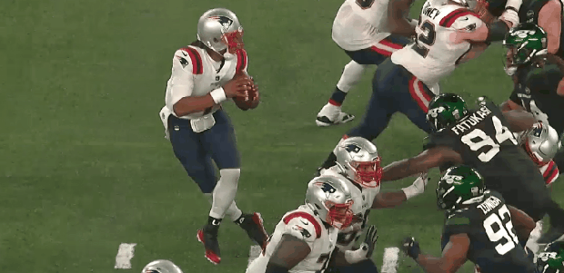 Cam avoids two sacks, completes pass 