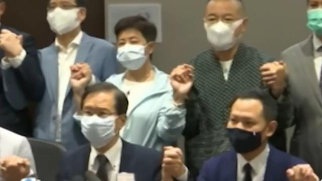 cbsn-fusion-pro-democracy-lawmakers-in-hong-kong-resign-en-masse-amid-crackdown-by-beijing-thumbnail-586051-640x360.jpg 