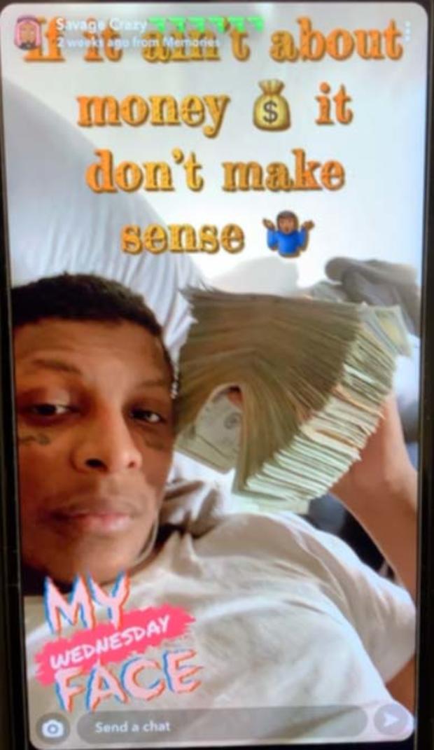 Johnson social media posting holding cash 