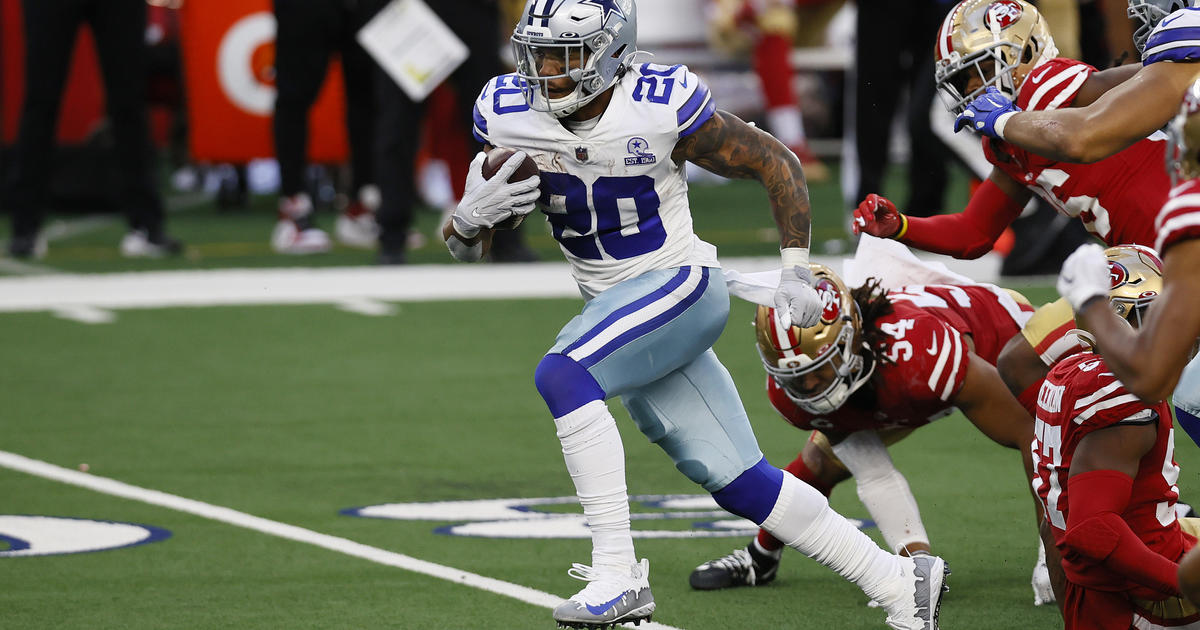 Running back Tony Pollard of the Dallas Cowboys runs the ball for a News  Photo - Getty Images