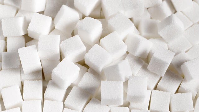 pile of unhealthy white sugar cubes 