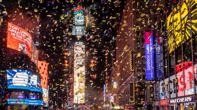 Confetti flies around the ball and countdown clock in Times Square during the virtual New Year's Eve event following the outbreak of the coronavirus disease (COVID-19) in the Manhattan borough of New York City 