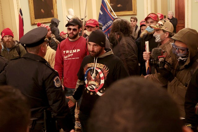 QAnon Trump supporter inside Capitol 