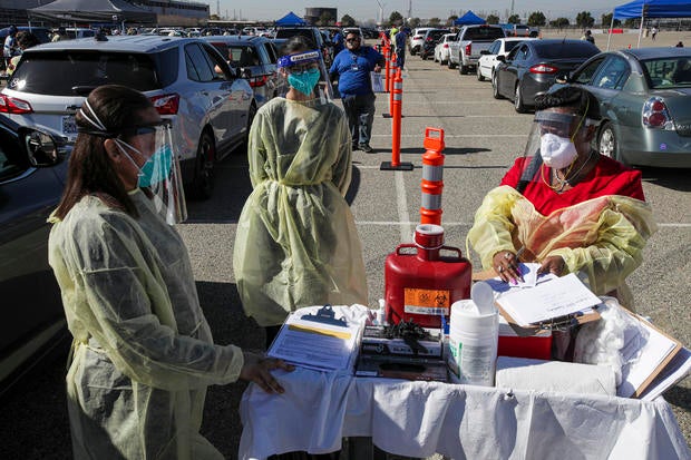 San Bernardino County health holds a COVID-19 vaccination event at Auto Club Speedway. Moderna mRNA-1273 vaccine 