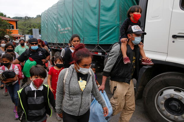 Honduran migrants are sent back by Guatemalan authorities 