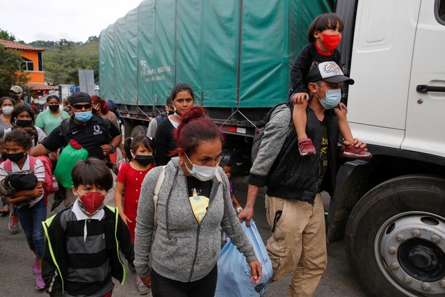 Honduran migrants are sent back by Guatemalan authorities 