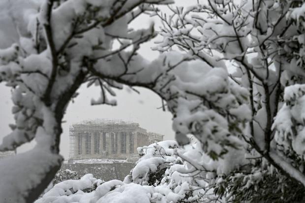 GREECE-WEATHER-SNOW-HISTORY-HERITAGE 