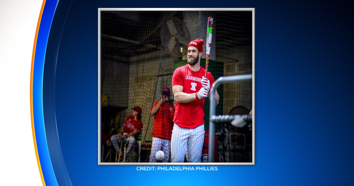 Bryce Harper, Wearing a Clearwooder Shirt and Wielding a Phillie Phanatic  Bat - Crossing Broad