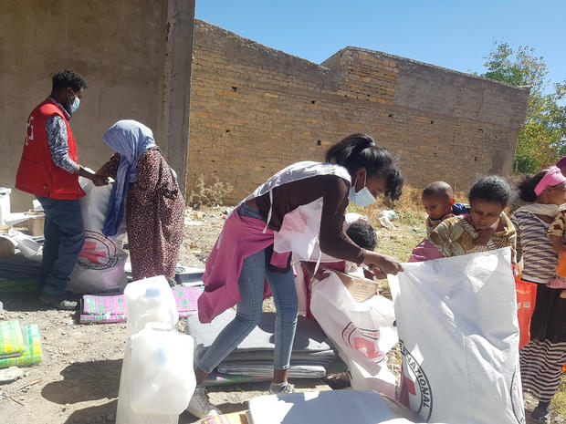 Workers from the International Committee of the Red Cross (ICRC) and volunteers from the Ethiopian Red Cross, distribute relief supplies to civilians in Tigray region 