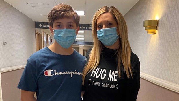 Donna LaMonaca and son, Geno, at a vaccination site.