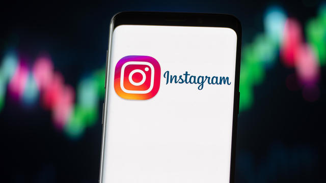 In this photo illustration an Instagram logo seen displayed 