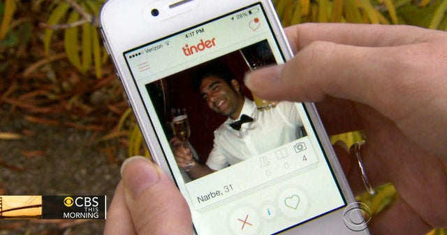 Tinder app all the rage among singles - CBS News