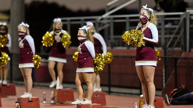 high_school_cheerleaders_covid-19_1273790857.jpg 