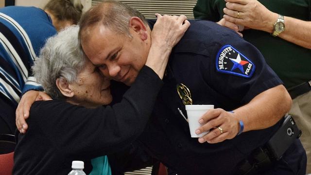 thumbnail_Police-Chief-Charles-Cato-gets-a-hug-from-resident-at-a-senior-center-Mesquite-TX.jpg 