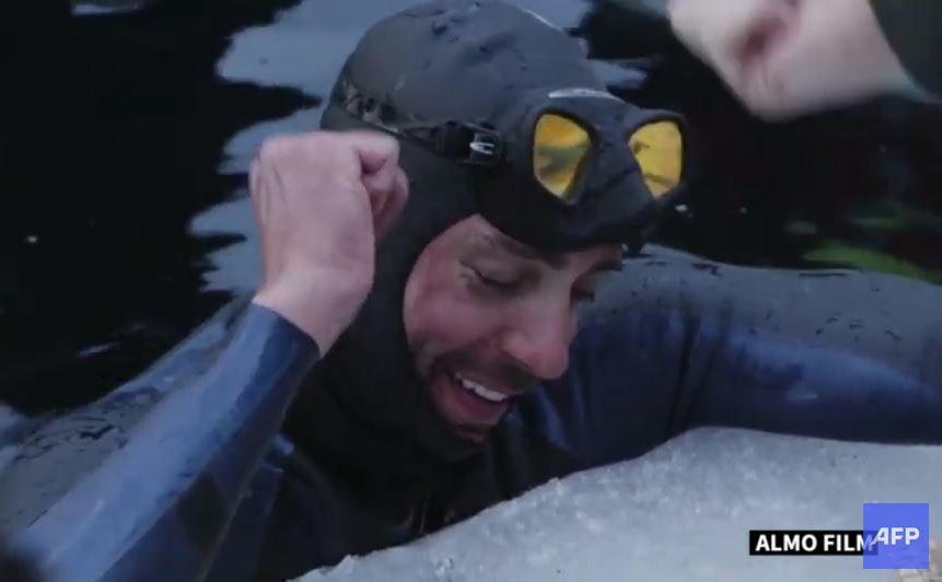 French freediver smashes world record with swim under ice CBS News