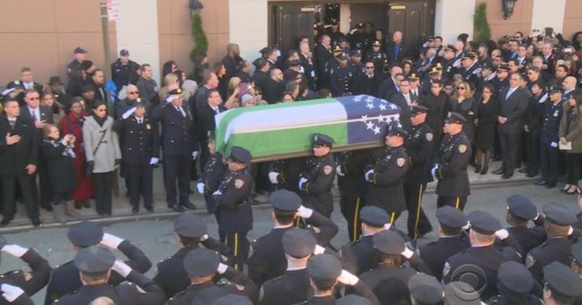 Thousands honor fallen NYPD officer CBS News