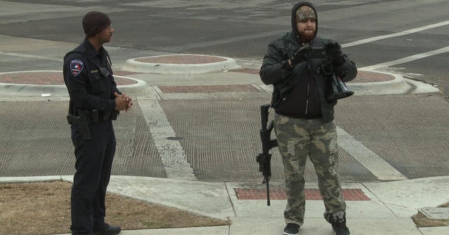 Policing the police, with guns added into the mix - CBS News