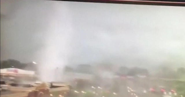 Tornado touches down near shopping center - CBS News