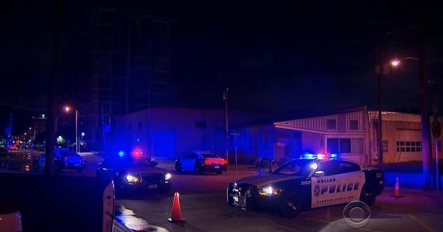 Dallas police headquarters hit with automatic gunfire CBS News