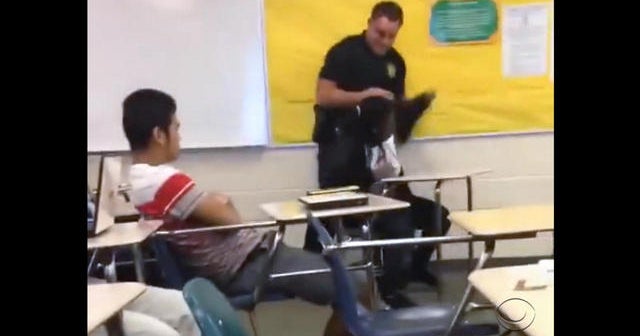 Caught on tape: School official slams student to ground - CBS News