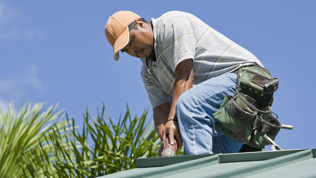 Field workers pick strawberries in Oxnard, California 