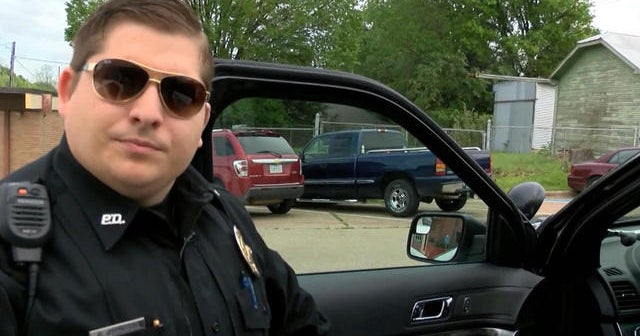 Watch: Police officer leaves body cam on, sings horribly - CBS News