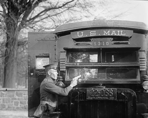 Uniformed Postal Official tests Regulation Army 44 Colt and its effect on bullet proof glass used in the new armored postal trucks 