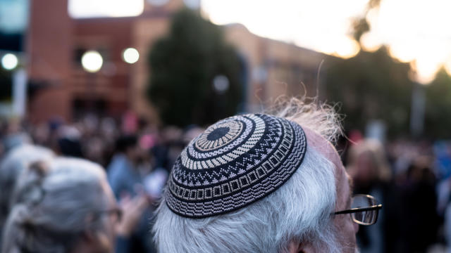 Yarmulke on man seen in front of JCC during the protest 