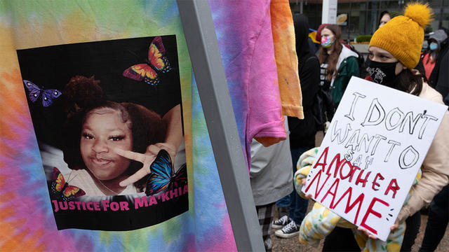 Black-Lives-Matter-activist-holds-a-placard-during-the-March.jpg 