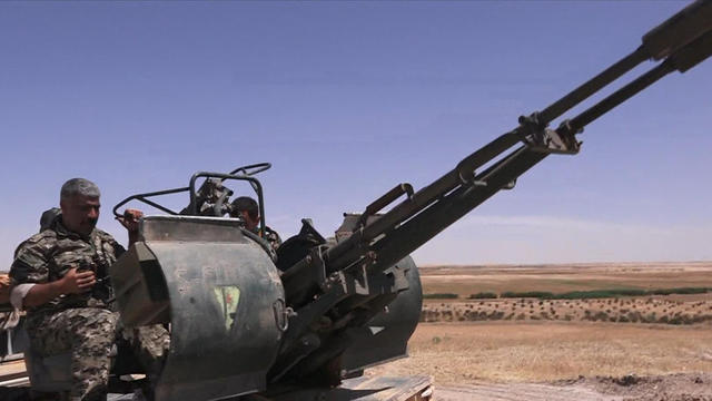 051717-cbsn-fightingraqqa-1317037-640x360.jpg 