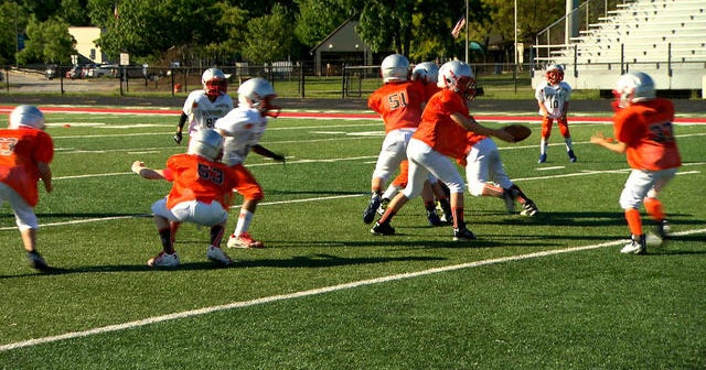 Youth football to test "rookie tackle" version of sport CBS News