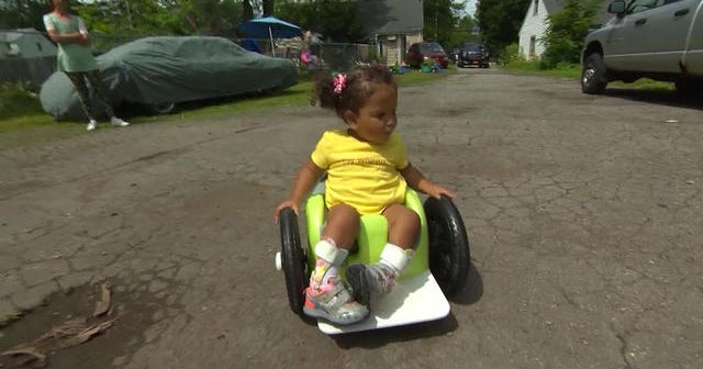 Homemade wheelchair gives toddler mobility for first time CBS News