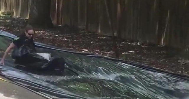 These cops got called to break up a Slip 'N Slide party - and they had ...