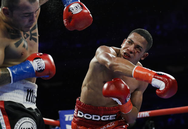 Puerto Rico's Félix Verdejo, right, punches Costa Rica's Bryan Vazquez during the fifth round of a lightweight boxing match in New York, April 20, 2019. 