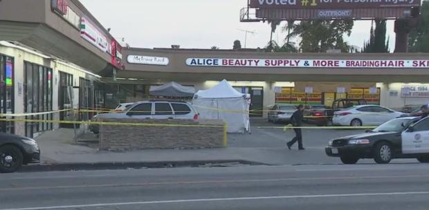 Two Men Killed, Woman Wounded When Gunfire Erupts At Mid-City Strip Mall 