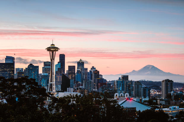 Skyline at dawn with Space Needle and Mt Rainier, Seattle, USA 