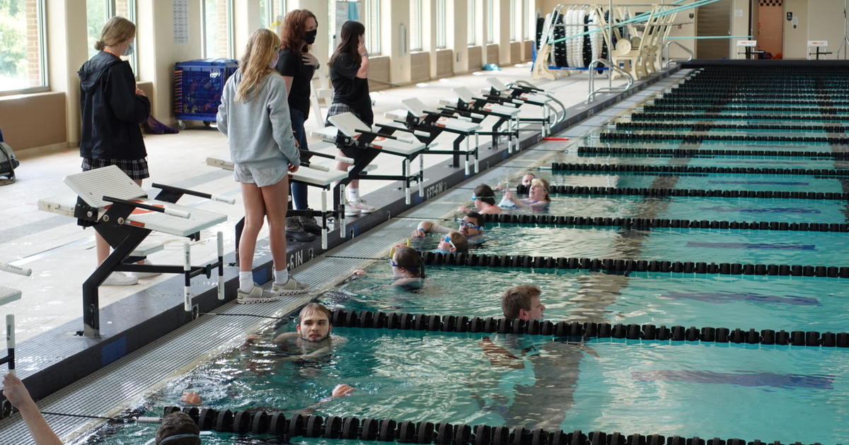 Watch CBS Evening News: Texas twins teach children how to swim with a  splash of confidence - Full show on CBS