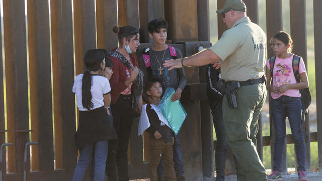 Asylum seekers enter the United States along the Arizona border 
