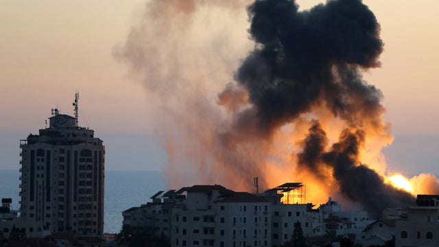 Smoke and flames rise during Israeli airstrikes as cross-border violence between the Israeli military and Palestinian militants continues in Gaza City May 14, 2021. 