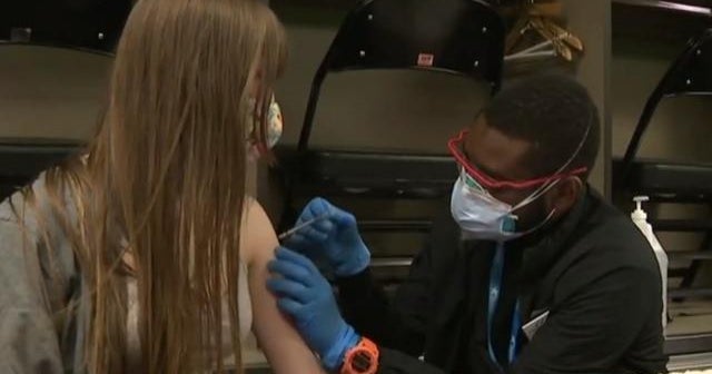 CDC updates face mask guidance as U.S. COVID cases decline - CBS News