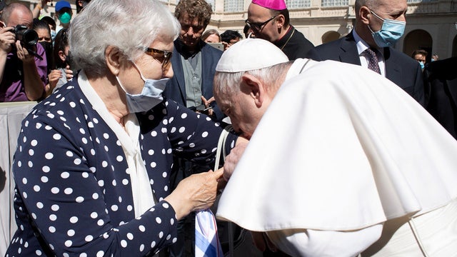 Pope meets Holocaust survivor, kisses concentration camp number tattooed on her arm 