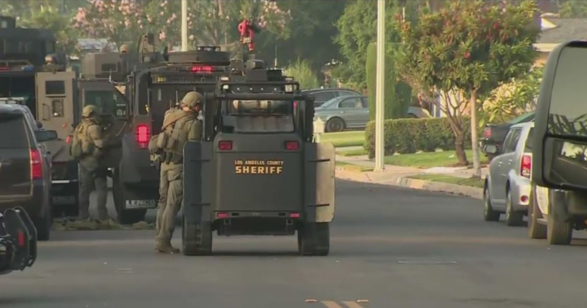 SWAT Standoff Continues With Vehicular Manslaughter Suspect Holed Up In