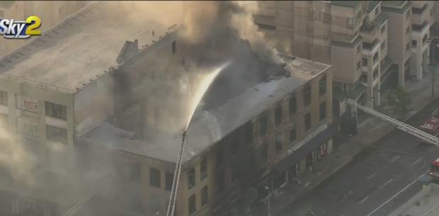 Multiple Explosions As Blaze Engulfs Century-Old Commercial Building In Downtown LA 